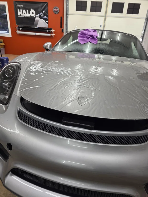 Silver 2016 Porsche Boxster during protection installation in Medford, Oregon.