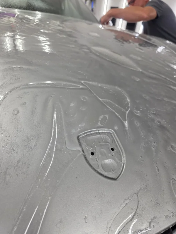 Additional protection installation view of the silver 2016 Porsche Boxster in Medford, Oregon.